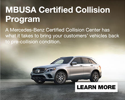 Vehicle lift alongside red car